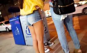 street-voyeur-finds-a-slender-brunette-teen-in-tight-shorts