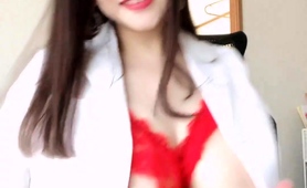 Asian Beauty In Stockings Flashes Her Marvelous Big Tits