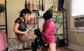 Merciless mistress straps up to fuck pitiful masked slave