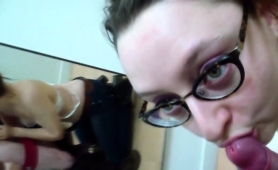 busty-girl-with-glasses-milks-a-cock-with-her-lips-in-public